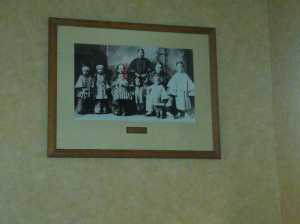 A portrait of Fee Lee Wong and his children hangs in the Deadwood Pizza Hut.