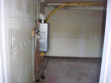 The inside of our addition is much tidier and warmer. Our hot water heater will appreciate the effort.