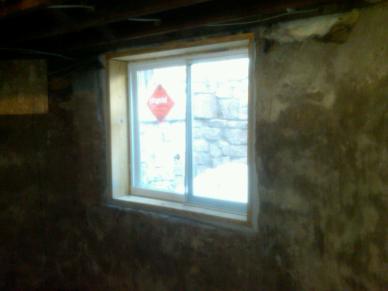 The egress windows in our basement are finished!