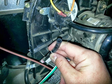 I disconnected the bottom hose, blew through it, and the furnace gurgled. High-voltage gas-powered appliances shouldn't gurgle.